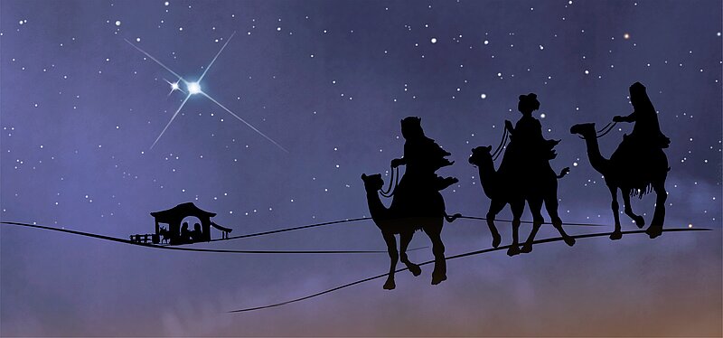 Drei Kamelreiter im Scherenschnitt, die heiligen drei Könige, folgen dem Stern von Bethlehem zur Krippe.